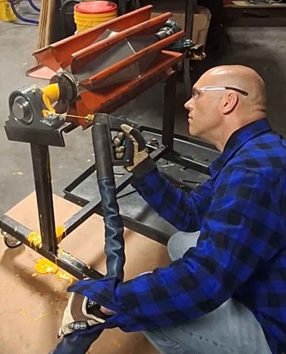 Tim applying Enviropeel to a bearing. 
